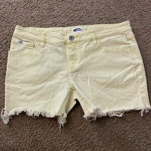 Vans Jean cut off shorts. Pale yellow